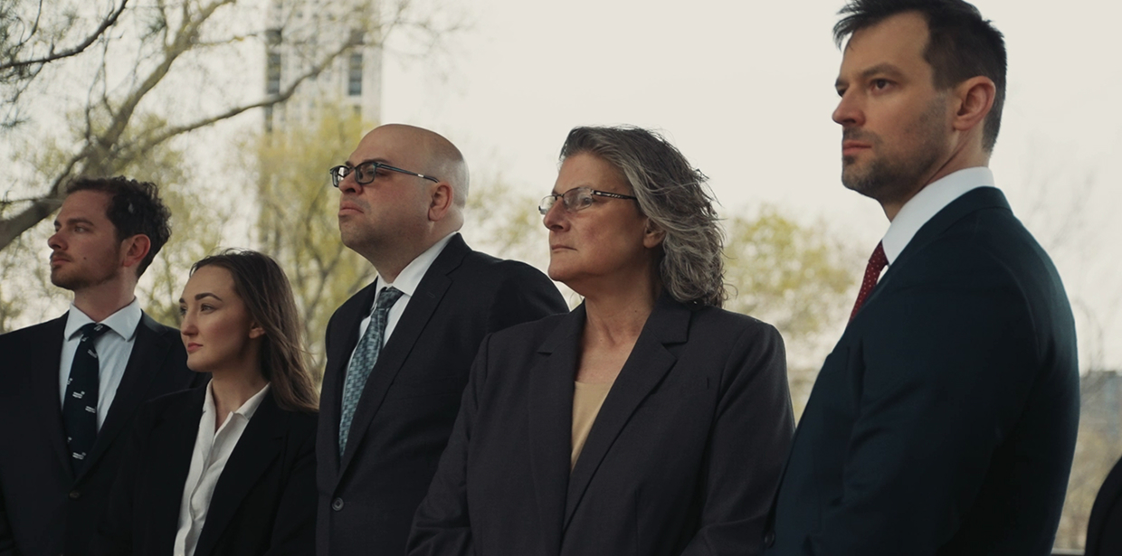 Wanta Thome partners and legal team standing together outdoors