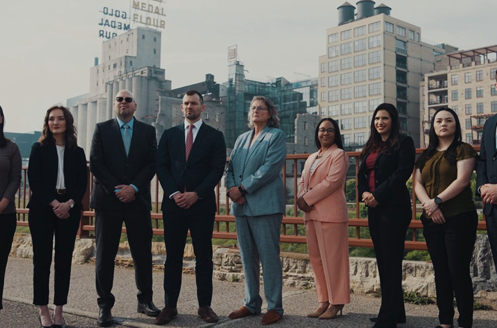 Wanta Thome attorneys standing together