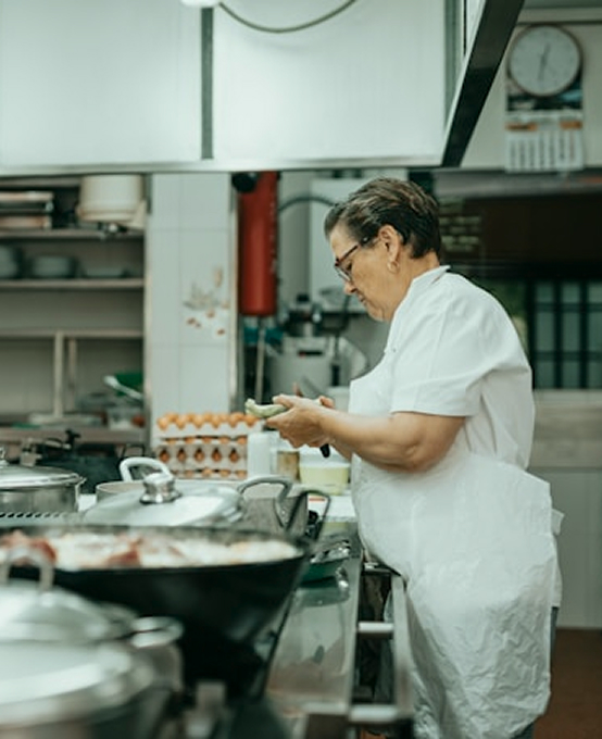 Chef cooking in a commercial kitchen