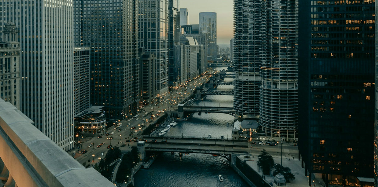 Chicago skyline along the Chicago River at dusk