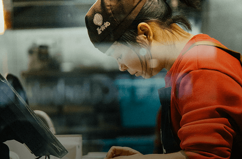 Worker at a register