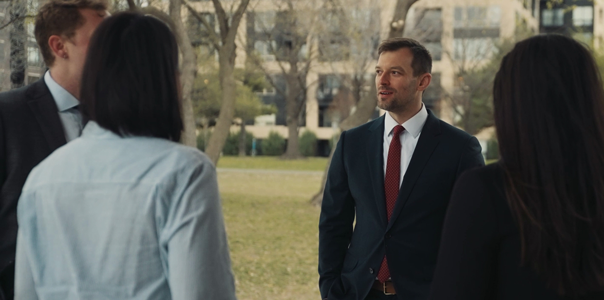 Wanta Thome partner talking with other attorneys outdoors