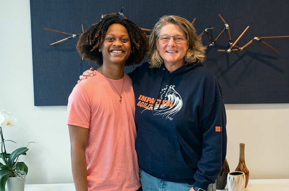 Isaiah Kelly standing with attorney Joni Thome